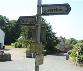 Look closely there are 2 scrubbed out Cumbria Cycleway signs. These point to the road that led to the bridleway at Cartmel